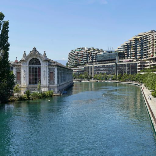 Rhône river with historical power plant building